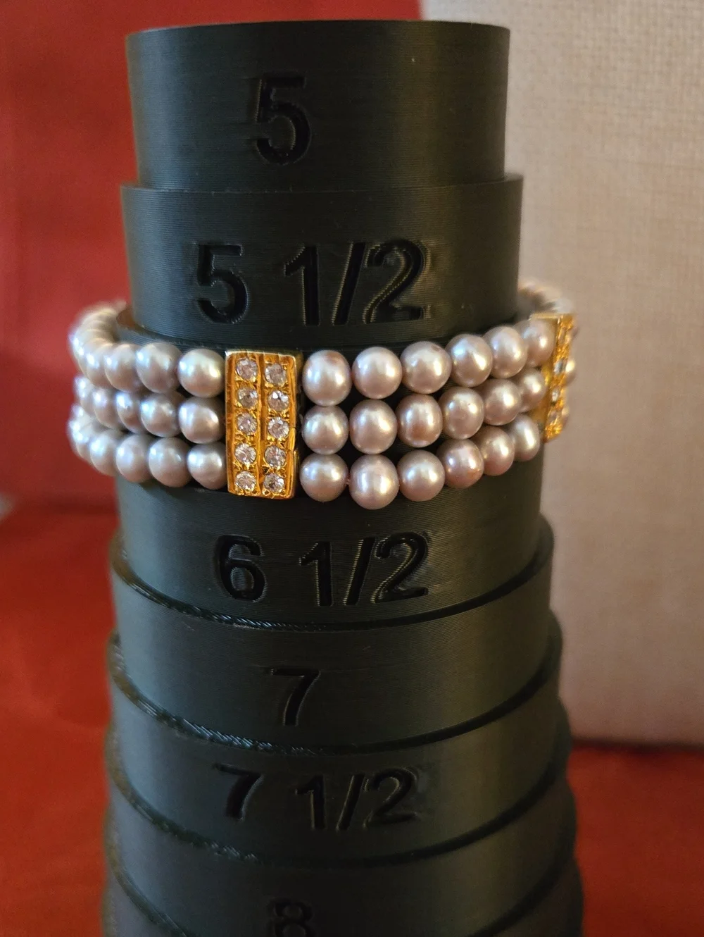 Triple-Row Pearl Bracelet with Gold Crystal Accents